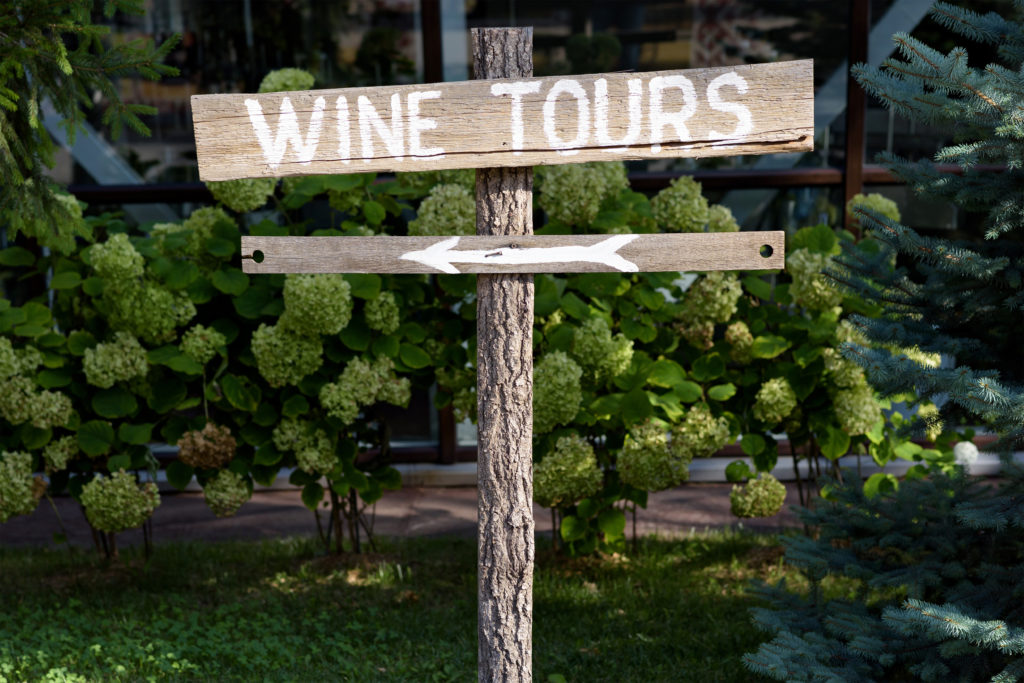 Wine Tours sign on the street